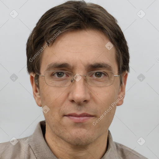 Joyful white adult male with short  brown hair and grey eyes