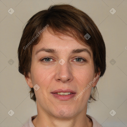 Joyful white adult female with medium  brown hair and grey eyes