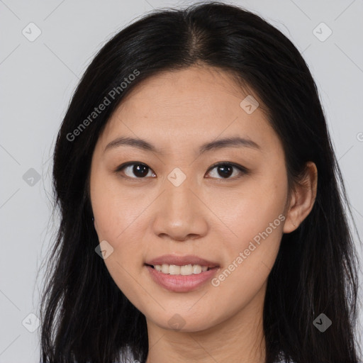 Joyful asian young-adult female with long  brown hair and brown eyes