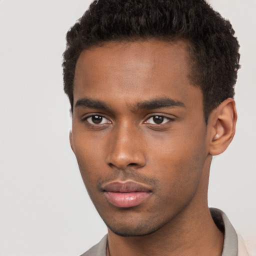 Neutral black young-adult male with short  brown hair and brown eyes