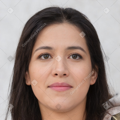 Joyful asian young-adult female with long  brown hair and brown eyes