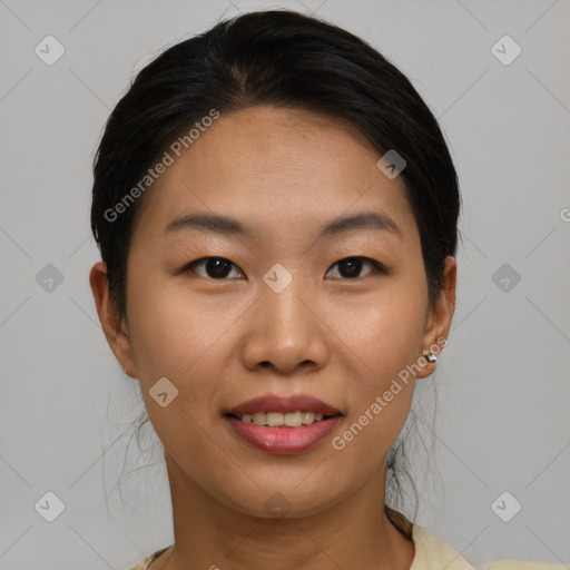 Joyful asian young-adult female with short  brown hair and brown eyes