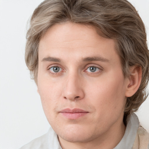 Neutral white young-adult male with medium  brown hair and grey eyes