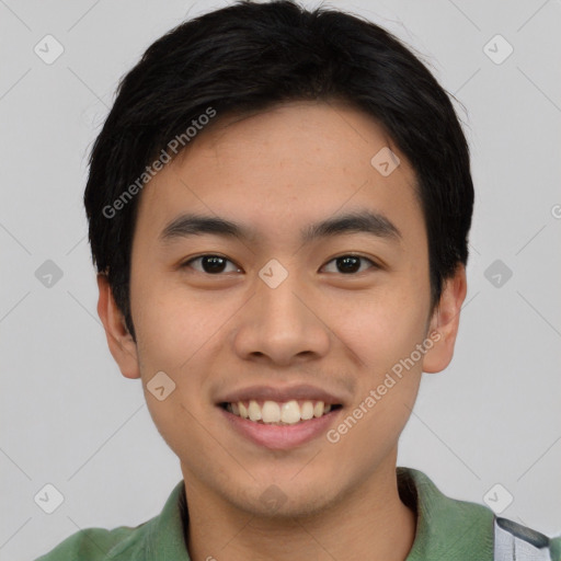 Joyful asian young-adult male with short  black hair and brown eyes