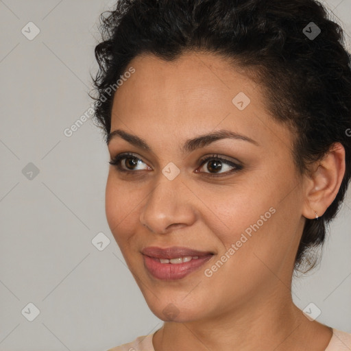 Joyful latino young-adult female with short  brown hair and brown eyes