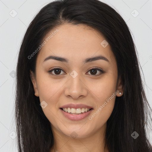 Joyful latino young-adult female with long  brown hair and brown eyes