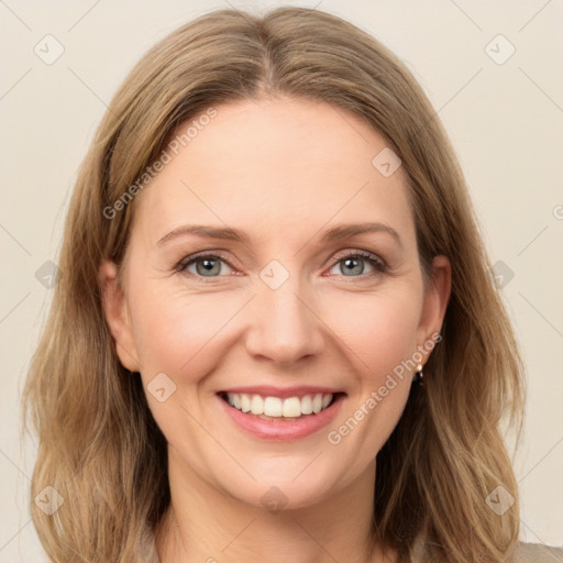 Joyful white young-adult female with medium  brown hair and green eyes