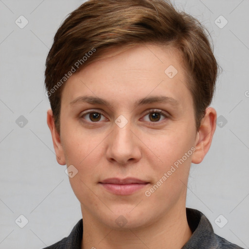 Joyful white young-adult female with short  brown hair and grey eyes