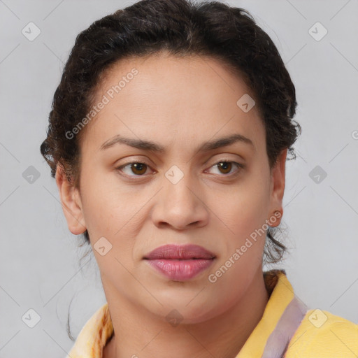 Joyful latino young-adult female with short  brown hair and brown eyes