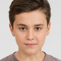 Joyful white child male with short  brown hair and brown eyes