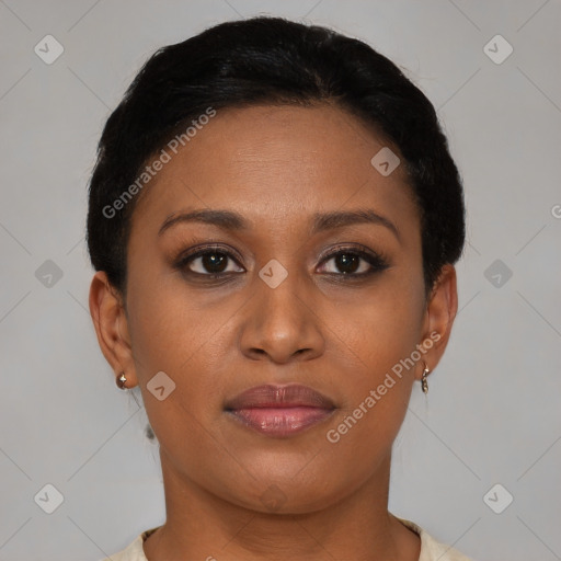 Joyful black young-adult female with short  brown hair and brown eyes