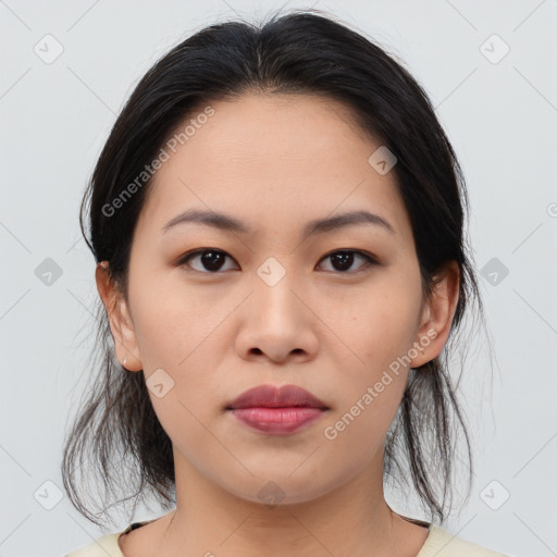 Joyful asian young-adult female with medium  brown hair and brown eyes