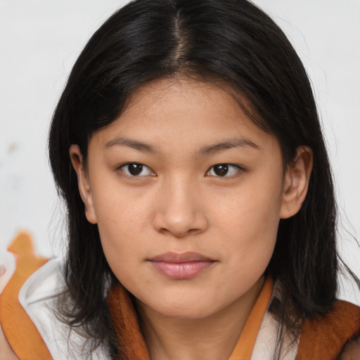 Joyful asian young-adult female with medium  brown hair and brown eyes