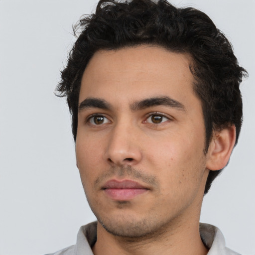 Neutral white young-adult male with short  black hair and brown eyes