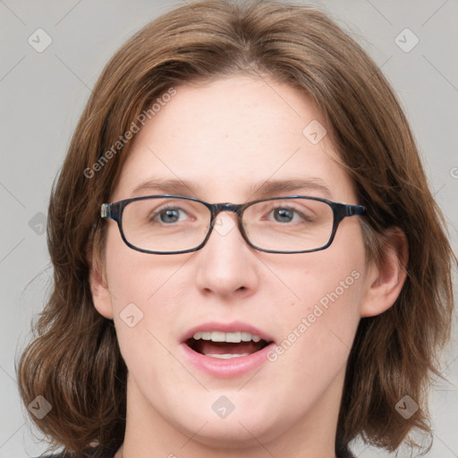 Joyful white young-adult female with medium  brown hair and blue eyes