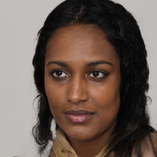 Neutral black young-adult female with long  black hair and brown eyes