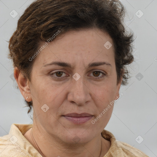 Joyful white adult female with short  brown hair and brown eyes