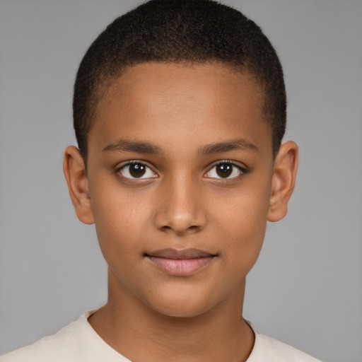 Joyful black child female with short  brown hair and brown eyes
