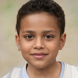 Joyful white child male with short  brown hair and brown eyes