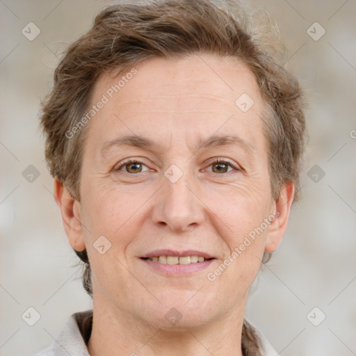 Joyful white adult female with short  brown hair and grey eyes