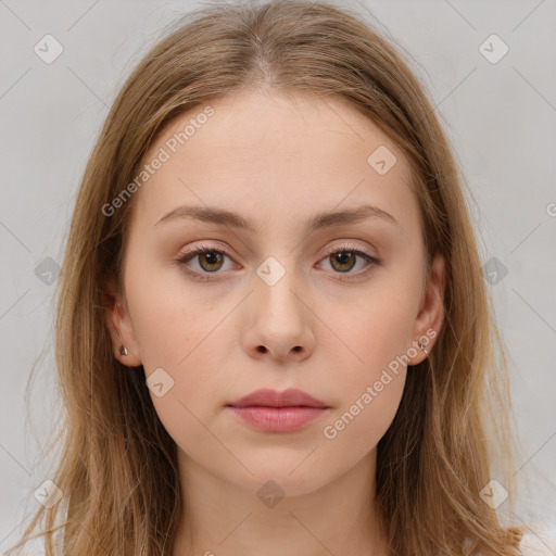 Neutral white young-adult female with long  brown hair and brown eyes