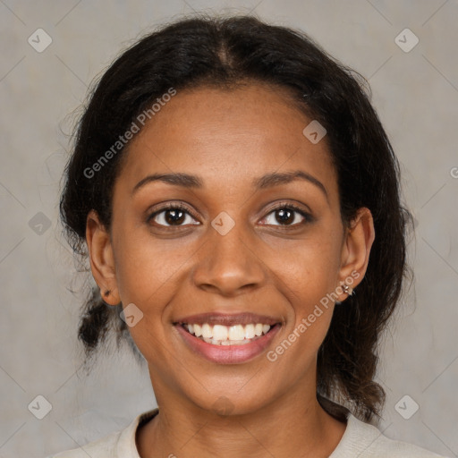 Joyful black young-adult female with medium  brown hair and brown eyes