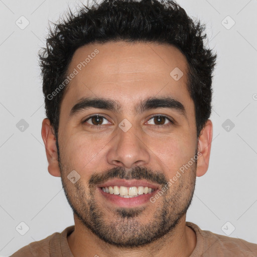 Joyful white young-adult male with short  black hair and brown eyes