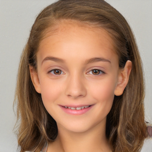 Joyful white child female with long  brown hair and brown eyes