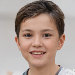 Joyful white child female with short  brown hair and brown eyes