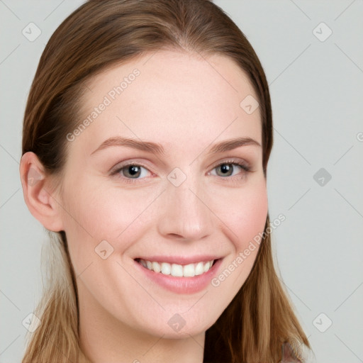 Joyful white young-adult female with long  brown hair and blue eyes