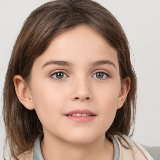 Joyful white child female with medium  brown hair and brown eyes