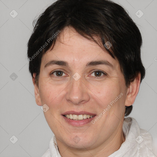 Joyful white adult female with short  brown hair and brown eyes