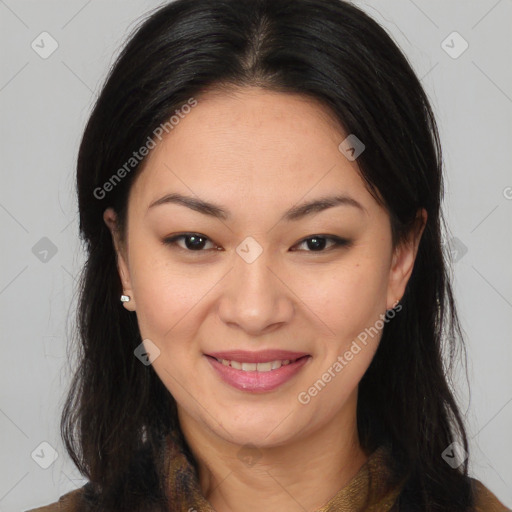 Joyful asian young-adult female with long  brown hair and brown eyes