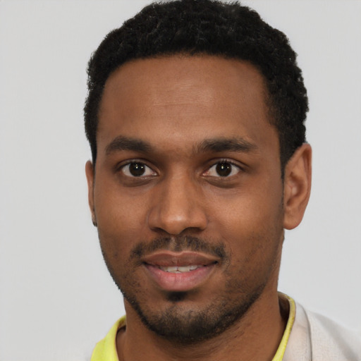 Neutral black young-adult male with short  brown hair and brown eyes