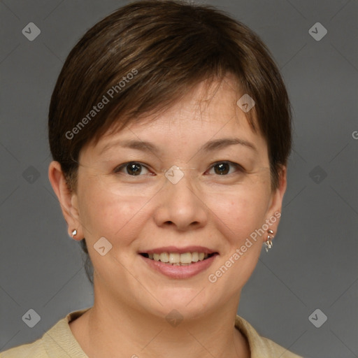 Joyful white adult female with short  brown hair and brown eyes