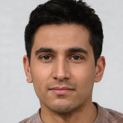 Neutral white young-adult male with short  black hair and brown eyes
