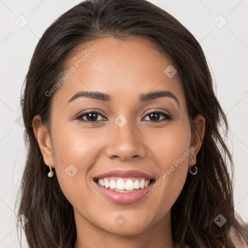 Joyful white young-adult female with long  brown hair and brown eyes