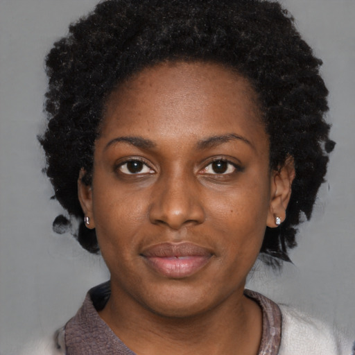 Neutral black young-adult female with short  black hair and brown eyes
