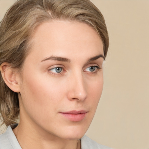 Neutral white young-adult female with medium  brown hair and blue eyes