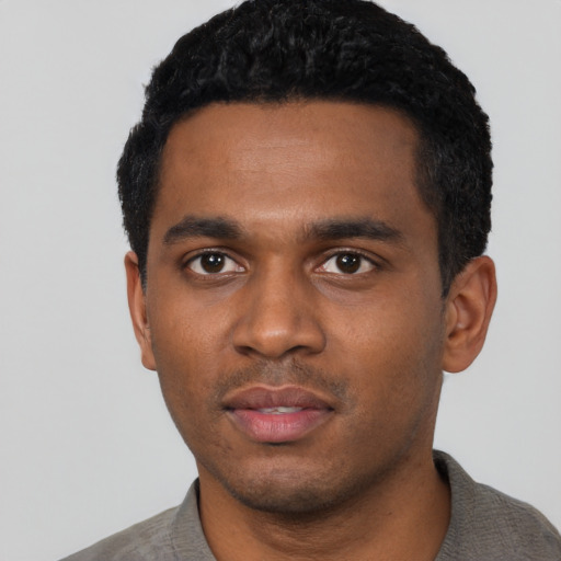 Neutral black young-adult male with short  black hair and brown eyes