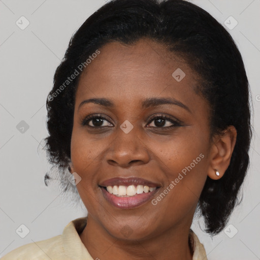 Joyful black young-adult female with medium  brown hair and brown eyes