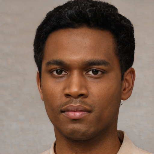 Neutral black young-adult male with short  black hair and brown eyes