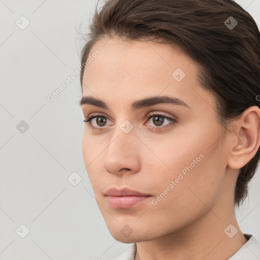 Neutral white young-adult female with short  brown hair and brown eyes