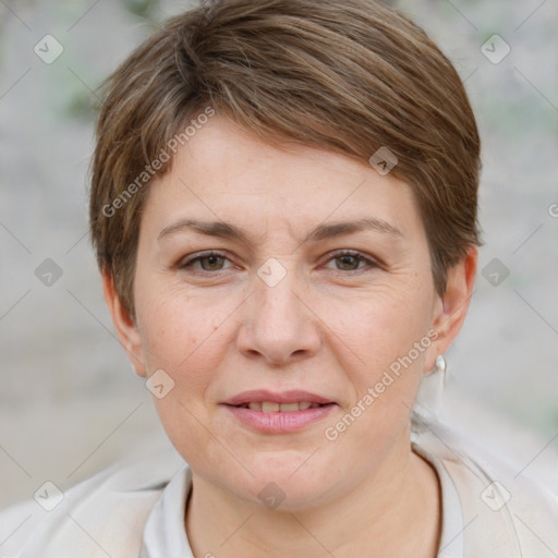 Joyful white adult female with short  brown hair and brown eyes