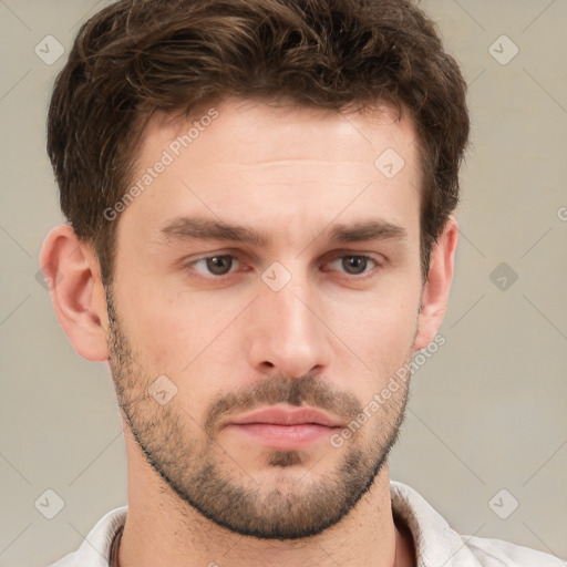 Neutral white young-adult male with short  brown hair and brown eyes