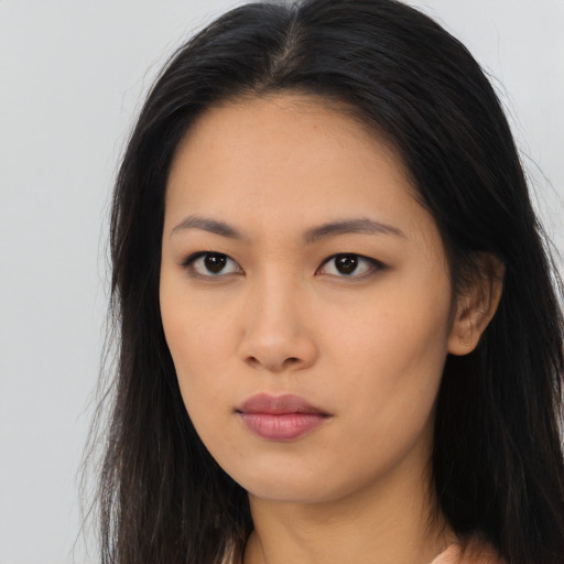 Neutral asian young-adult female with long  black hair and brown eyes