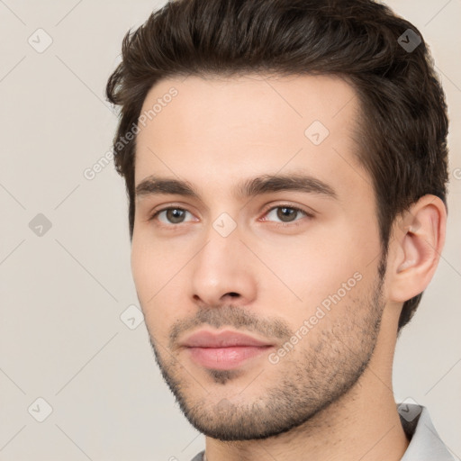 Neutral white young-adult male with short  brown hair and brown eyes