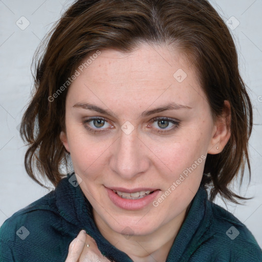 Joyful white young-adult female with medium  brown hair and blue eyes