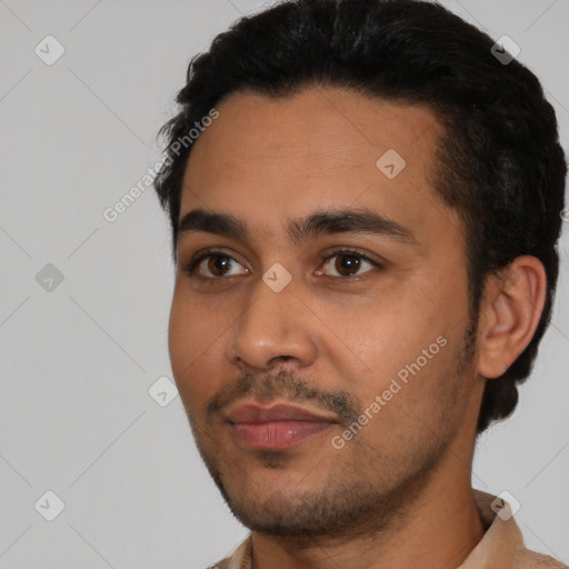 Neutral latino young-adult male with short  black hair and brown eyes