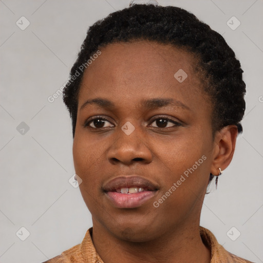 Joyful black young-adult female with short  black hair and brown eyes